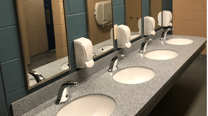 public restroom with new Chicago Faucets sensor faucets