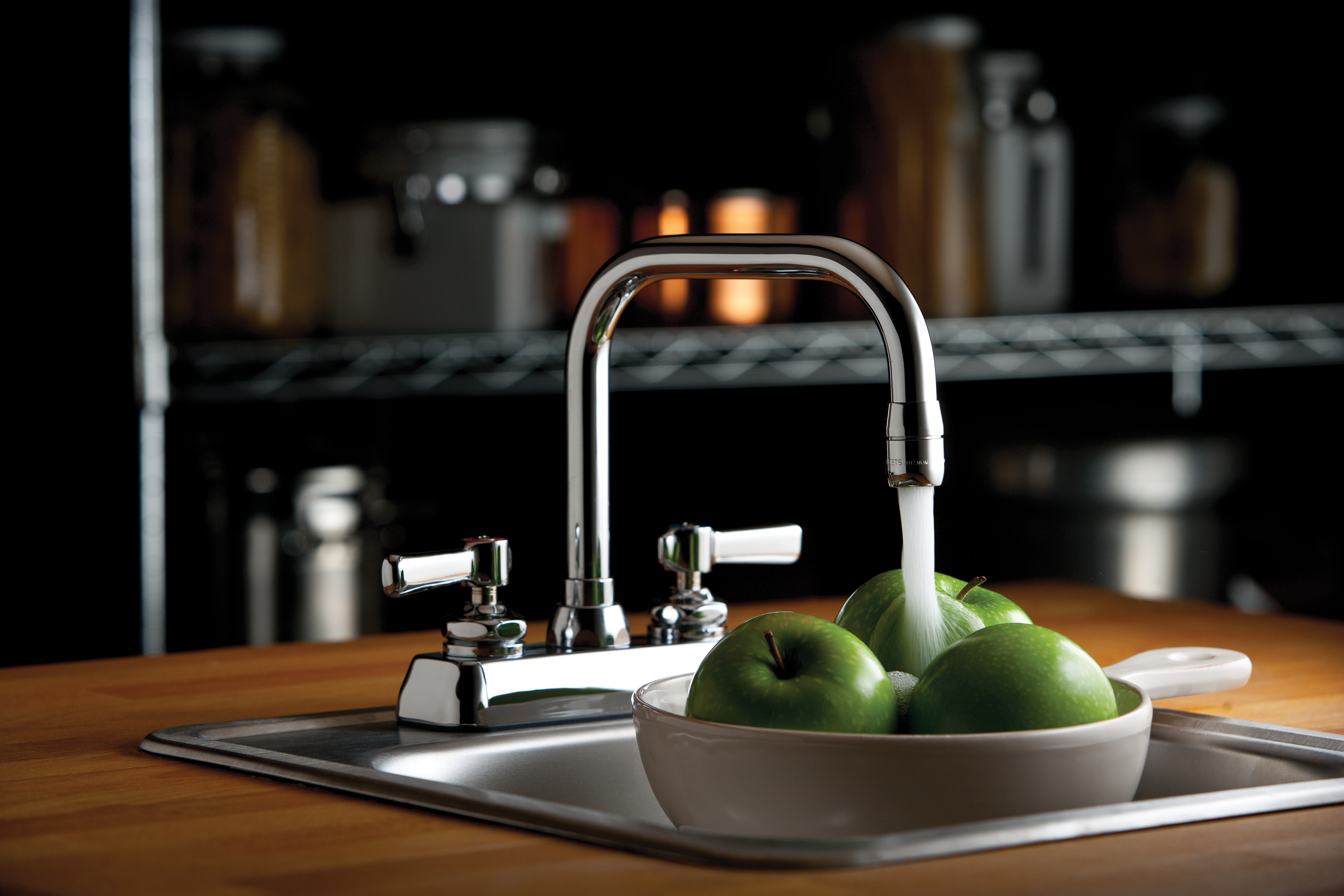 Commercial kitchen faucet washing fruit