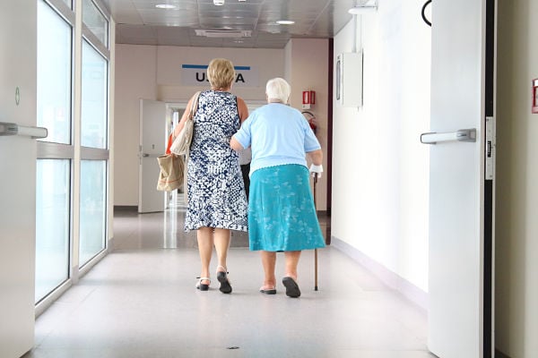 Canva - Adult Woman Walking with Her Senior Mother in the Hospital_OPTIMIZED-1